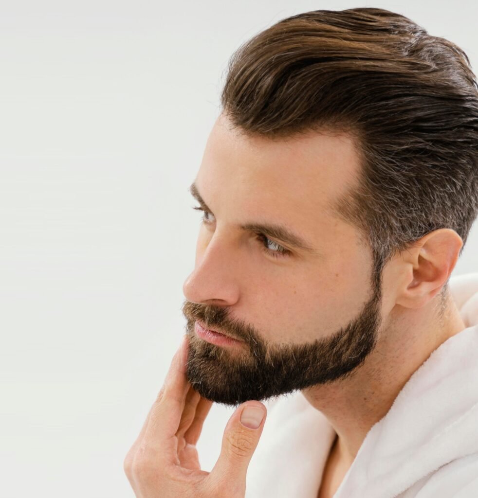 Man with well-groomed beard showing laser-sculpted results